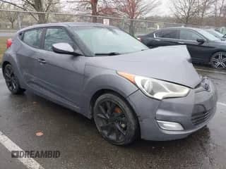 2017 Hyundai Veloster z VIN KMHTC6AD4HU309625, wystawiony jako IAAI lot #41933497 z przebiegiem 184 632 mil mil oraz . Historia ofert i sprzedaży dostępna na DreamBid. Obrazek 1.