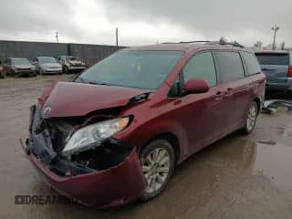 2014 Toyota Sienna LE z VIN 5TDJK3DC8ES083704, wystawiony jako Copart lot #84932195 z przebiegiem 210 428 mil mil oraz Szkoda całkowita • Salvage title. Historia ofert i sprzedaży dostępna na DreamBid. Obrazek 1.