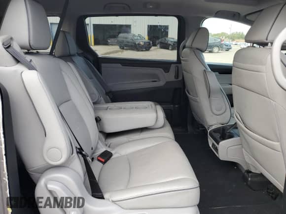 2022 Honda Odyssey Elite z VIN 5FNRL6H93NB063784, wystawiony jako Copart lot #85907215 z przebiegiem 28 474 mil mil oraz Szkoda całkowita • Salvage title. Historia ofert i sprzedaży dostępna na DreamBid. Obrazek 11.