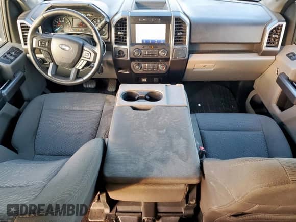 2020 Ford F-150 XL z VIN 1FTEW1C4XLFA51144, wystawiony jako Copart lot #84428555 z przebiegiem 129 716 mil mil oraz Szkoda całkowita • Salvage title. Historia ofert i sprzedaży dostępna na DreamBid. Obrazek 8.