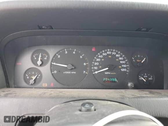 2002 Jeep Grand Cherokee Laredo with VIN 1J8GW48S82C159112, listed as a Copart auction lot 84000665 with 204,396 mi miles and Salvage title. Bid and sale history available at DreamBid. Image 9.