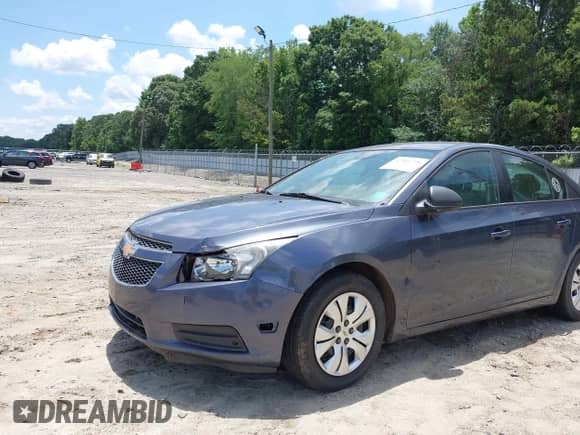 2013 Chevrolet Cruze LS with VIN 1G1PB5SH2D7176823, listed as a IAAI auction lot 42560746 with 157,124 mi miles and . Bid and sale history available at DreamBid. Image 6.