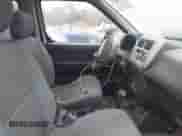 2001 Nissan Frontier SE with VIN 1N6ED27T91C318489, listed as a IAAI auction lot 41441798 with 214,834 mi miles and . Bid and sale history available at DreamBid. Image 5.