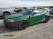 2004 Hyundai Tiburon GT с VIN KMHHN65F74U129996, выставлен на аукционе Copart как лот 43359015 с пробегом 231 277 миль миль и Списание • Salvage title. История ставок и продаж доступна на DreamBid. Изображение 1.