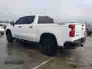 2024 Chevrolet Silverado 1500 Custom Trail Boss with VIN 3GCPDCEK1RG233344, listed as a Copart auction lot 44250765 with 5,906 mi miles and Salvage title. Bid and sale history available at DreamBid. Image 2.