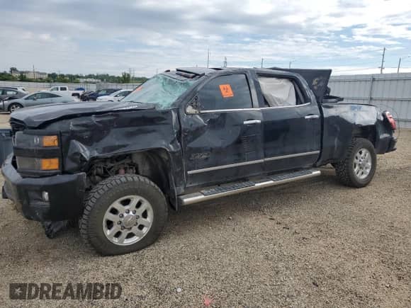 2015 Chevrolet Silverado 3500HD LTZ с VIN 1GC4K0E83FF677902, выставлен на аукционе Copart как лот 58402085 с пробегом Не указан миль и Списание • Salvage title. История ставок и продаж доступна на DreamBid. Изображение 1.