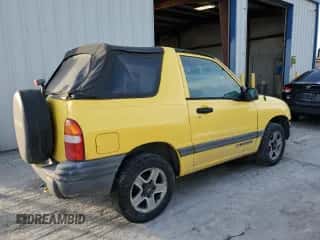 2002 Chevrolet Tracker z VIN 2CNBE18C626945359, wystawiony jako Copart lot #46819133 z przebiegiem 164 525 mil mil oraz Nie do naprawy • Non repairable. Historia ofert i sprzedaży dostępna na DreamBid. Obrazek 3.