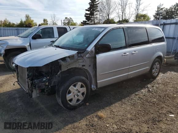 2012 Dodge Grand Caravan American Value z VIN 2C4RDGBG1CR102500, wystawiony jako Copart lot #80715305 z przebiegiem 189 253 mil mil oraz Szkoda całkowita • Salvage title. Historia ofert i sprzedaży dostępna na DreamBid. Obrazek 1.