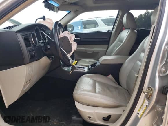 2006 Dodge Magnum with VIN 2D4FV47V76H124195, listed as a Copart auction lot 48734725 with 196,437 mi miles and Salvage title. Bid and sale history available at DreamBid. Image 7.