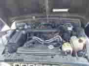 2002 Jeep Wrangler Sahara z VIN 1J4FA59S02P703627, wystawiony jako IAAI lot #42815504 z przebiegiem 144 573 mil mil oraz . Historia ofert i sprzedaży dostępna na DreamBid. Obrazek 10.