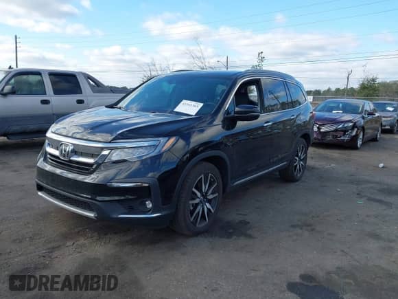 2021 Honda Pilot Touring 7-Passenger с VIN 5FNYF5H68MB000651, выставлен на аукционе IAAI как лот 41541365 с пробегом 49 308 миль миль и . История ставок и продаж доступна на DreamBid. Изображение 17.