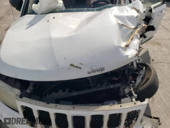 2011 Jeep Compass with VIN 1J4NT1FA5BD182383, listed as a Copart auction lot 86316605 with 205,579 mi miles and Salvage title. Bid and sale history available at DreamBid. Image 12.