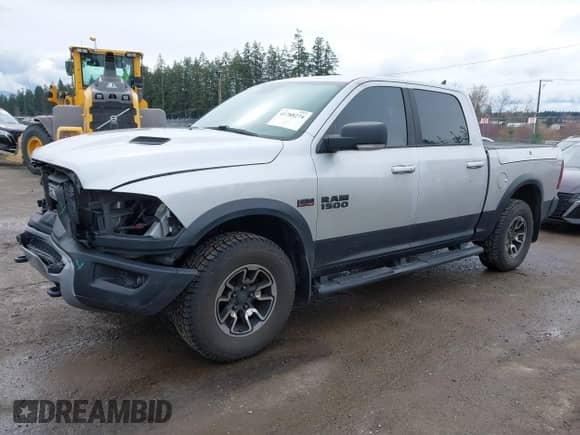 2018 Ram 1500 Rebel with VIN 1C6RR7YT5JS152633, listed as a IAAI auction lot 41788274 with 146,298 mi miles and . Bid and sale history available at DreamBid. Image 2.