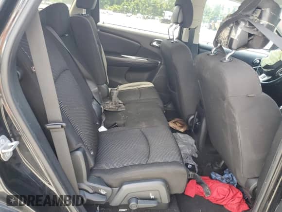 2014 Dodge Journey SXT with VIN 3C4PDCBB8ET304223, listed as a Copart auction lot 67085535 with 128,586 mi miles and Salvage title. Bid and sale history available at DreamBid. Image 11.