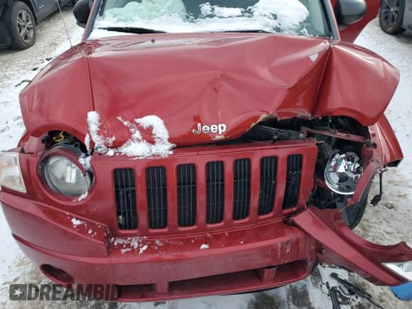 2010 Jeep Compass Latitude z VIN 1J4NF1FB0AD623710, wystawiony jako Copart lot #88657615 z przebiegiem Nie podano mil oraz Szkoda całkowita • Salvage title. Historia ofert i sprzedaży dostępna na DreamBid. Obrazek 13.