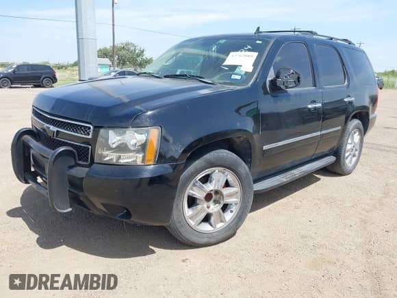 2009 Chevrolet Tahoe LTZ with VIN 1GNFC33J09R172584, listed as a IAAI auction lot 42762889 with 229,534 mi miles and . Bid and sale history available at DreamBid. Image 2.