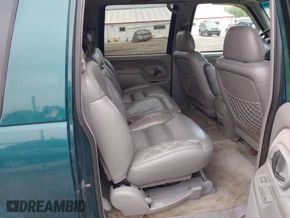 1995 Chevrolet Suburban with VIN 1GNEC16K3SJ381424, listed as a IAAI auction lot 42300584 with 128,745 mi miles and . Bid and sale history available at DreamBid. Image 8.