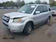 2006 Honda Pilot EX-L z VIN 5FNYF28586B009746, wystawiony jako IAAI lot #43229294 z przebiegiem 313 951 mil mil oraz . Historia ofert i sprzedaży dostępna na DreamBid. Obrazek 2.