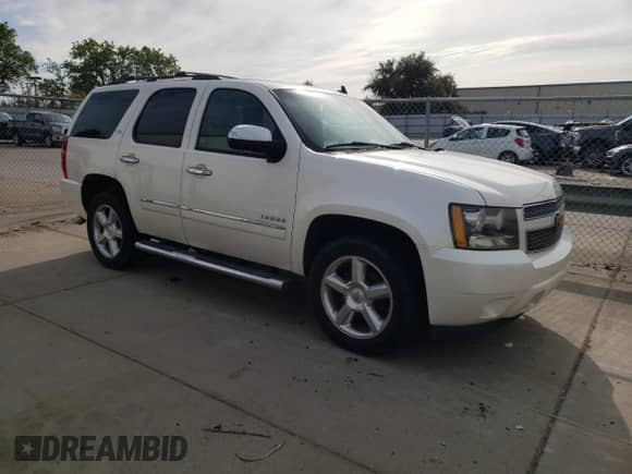 2012 Chevrolet Tahoe LTZ z VIN 1GNSCCE04CR213048, wystawiony jako Copart lot #51284685 z przebiegiem 192 733 mil mil oraz Czysty tytuł • Clean title. Historia ofert i sprzedaży dostępna na DreamBid. Obrazek 4.
