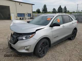 2021 Chevrolet Equinox Premier с VIN 2GNAXXEV3M6165784, выставлен на аукционе Copart как лот 67828294 с пробегом Не указан миль и Списание • Salvage title. История ставок и продаж доступна на DreamBid. Изображение 1.