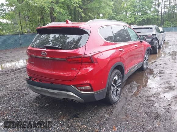 2020 Hyundai Santa Fe Limited with VIN 5NMS53AA2LH213247, listed as a IAAI auction lot 42371391 with 127,553 mi miles and . Bid and sale history available at DreamBid. Image 4.