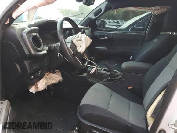 2022 Toyota Tacoma SR5 with VIN 3TMDZ5BN4NM130770, listed as a Copart auction lot 71835345 with 67,026 mi miles and Salvage title. Bid and sale history available at DreamBid. Image 7.