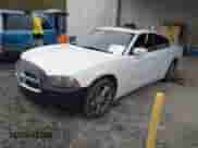 2013 Dodge Charger SXT with VIN 2C3CDXJG8DH528767, listed as a IAAI auction lot 41627596 with 204,619 mi miles and . Bid and sale history available at DreamBid. Image 2.