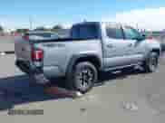 2021 Toyota Tacoma SR5 z VIN 3TMAZ5CN0MM140633, wystawiony jako IAAI lot #41365986 z przebiegiem 47 234 mil mil oraz . Historia ofert i sprzedaży dostępna na DreamBid. Obrazek 4.