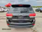 2014 Jeep Grand Cherokee Laredo с VIN 1C4RJEAGXEC145629, выставлен на аукционе Copart как лот 70733045 с пробегом 125 145 миль миль и Списание • Salvage title. История ставок и продаж доступна на DreamBid. Изображение 6.