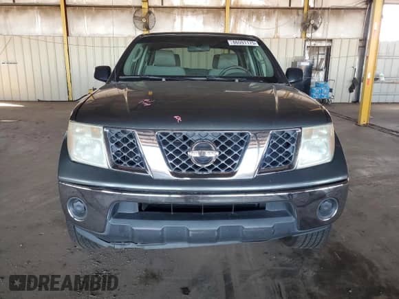 2007 Nissan Frontier SE with VIN 1N6AD07U67C431739, listed as a Copart auction lot 86591175 with 131,668 mi miles and Salvage title. Bid and sale history available at DreamBid. Image 5.