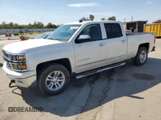 2014 Chevrolet Silverado 1500 LTZ z VIN 3GCUKSEC5EG254512, wystawiony jako Copart lot #70180875 z przebiegiem 128 784 mil mil oraz Szkoda całkowita • Salvage title. Historia ofert i sprzedaży dostępna na DreamBid. Obrazek 1.