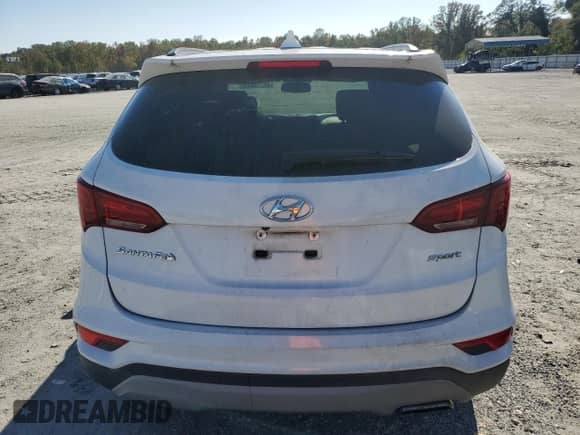 2018 Hyundai Santa Fe 2.4L z VIN 5NMZU3LB6JH088032, wystawiony jako Copart lot #86129015 z przebiegiem 157 606 mil mil oraz Czysty tytuł • Clean title. Historia ofert i sprzedaży dostępna na DreamBid. Obrazek 6.