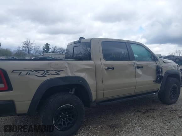 2022 Ram 1500 TRX with VIN 1C6SRFU95NN399791, listed as a IAAI auction lot 42040767 with 38,816 mi miles and . Bid and sale history available at DreamBid. Image 20.