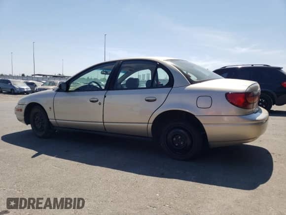 2000 Saturn SL with VIN 1G8ZK5274YZ103237, listed as a Copart auction lot 60558105 with 126,320 mi miles and Salvage title. Bid and sale history available at DreamBid. Image 2.