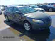 2007 Toyota Camry LE with VIN 4T1BK46K07U032299, listed as a IAAI auction lot 43320070 with 186,121 mi miles and . Bid and sale history available at DreamBid. Image 1.