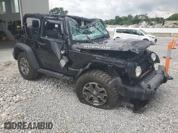 2015 Jeep Wrangler Rubicon z VIN 1C4HJWCG0FL755717, wystawiony jako Copart lot #61375435 z przebiegiem 153 207 mil mil oraz Szkoda całkowita • Salvage title. Historia ofert i sprzedaży dostępna na DreamBid. Obrazek 4.