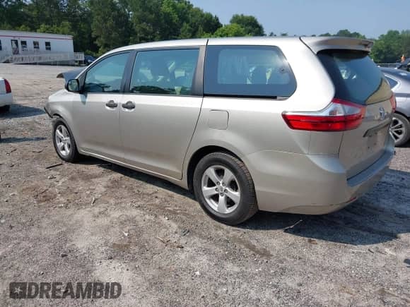 2015 Toyota Sienna L with VIN 5TDZK3DC4FS650415, listed as a IAAI auction lot 42395118 with 486,330 mi miles and . Bid and sale history available at DreamBid. Image 3.