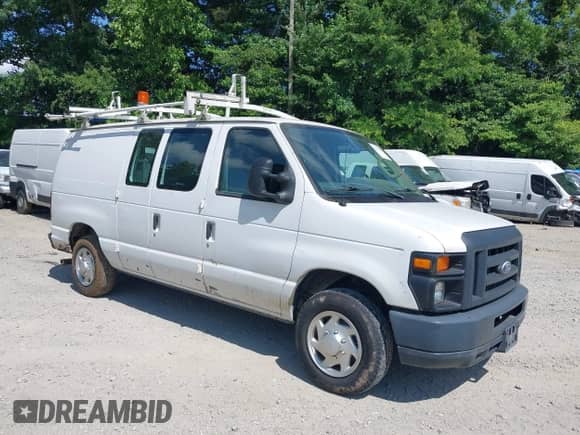 2014 Ford Econoline Cargo Commercial with VIN 1FTNE1EW8EDA98589, listed as a IAAI auction lot 42529081 with 186,595 mi miles and . Bid and sale history available at DreamBid. Image 1.