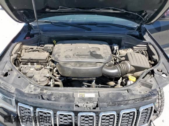 2018 Jeep Grand Cherokee Laredo z VIN 1C4RJEAG2JC480930, wystawiony jako Copart lot #65184965 z przebiegiem 70 700 mil mil oraz Szkoda całkowita • Salvage title. Historia ofert i sprzedaży dostępna na DreamBid. Obrazek 12.