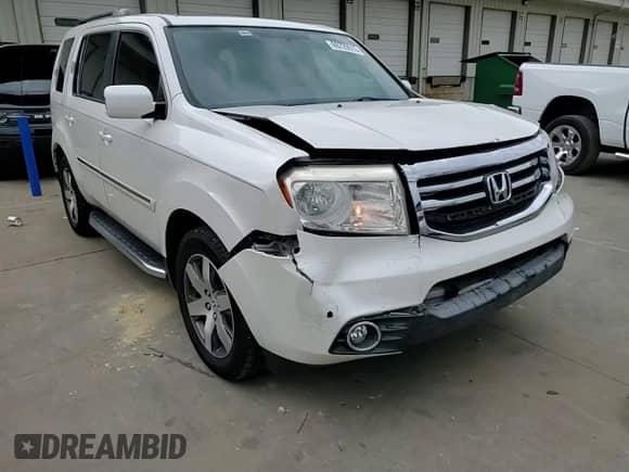 2014 Honda Pilot Touring with VIN 5FNYF3H92EB006641, listed as a Copart auction lot 69729915 with 162,386 mi miles and Salvage title. Bid and sale history available at DreamBid. Image 14.