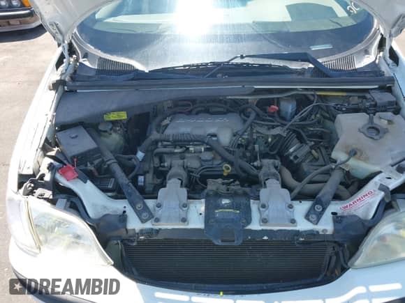 2004 Chevrolet Venture LS z VIN 1GNDX03E14D188330, wystawiony jako IAAI lot #42596114 z przebiegiem 186 128 mil mil oraz . Historia ofert i sprzedaży dostępna na DreamBid. Obrazek 10.