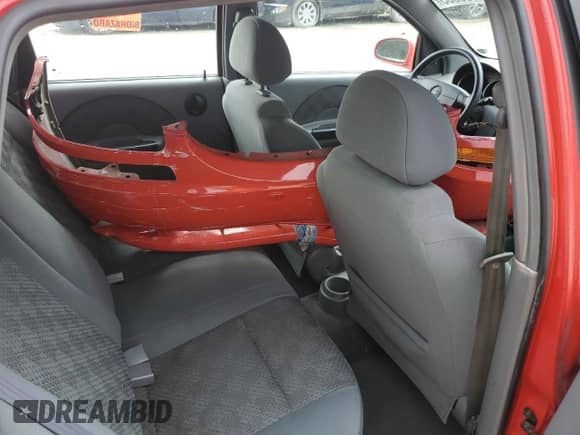 2005 Chevrolet Aveo LS с VIN KL1TD62635B353213, выставлен на аукционе Copart как лот 65935865 с пробегом 193 966 миль миль и Списание • Salvage title. История ставок и продаж доступна на DreamBid. Изображение 12.