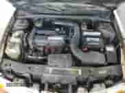 2000 Saturn SL with VIN 1G8ZK5271YZ182706, listed as a Copart auction lot 70810135 with 180,566 mi miles and Salvage title. Bid and sale history available at DreamBid. Image 11.