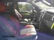 2014 Ford F-150 SVT Raptor z VIN 1FTFW1R67EFA40344, wystawiony jako IAAI lot #42723578 z przebiegiem 139 150 mil mil oraz . Historia ofert i sprzedaży dostępna na DreamBid. Obrazek 5.