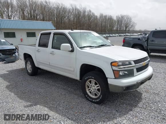 2011 Chevrolet Colorado 1LT z VIN 1GCHTCFE6B8141559, wystawiony jako IAAI lot #41812559 z przebiegiem 147 848 mil mil oraz . Historia ofert i sprzedaży dostępna na DreamBid. Obrazek 1.