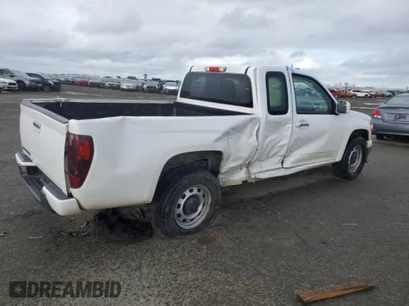 2012 Chevrolet Colorado Work Truck with VIN 1GCESBFE4C8129315, listed as a Copart auction lot 49639635 with 313,199 mi miles and Salvage title. Bid and sale history available at DreamBid. Image 3.