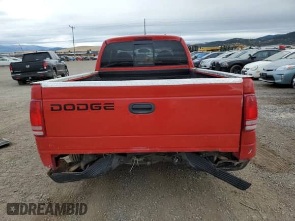 1998 Dodge Dakota SLT z VIN 1B7GL22X4WS573038, wystawiony jako Copart lot #44205935 z przebiegiem 126 293 mil mil oraz Czysty tytuł • Clean title. Historia ofert i sprzedaży dostępna na DreamBid. Obrazek 6.