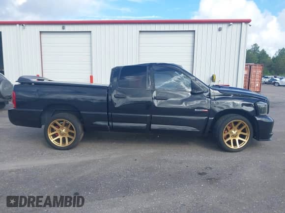 2006 Dodge Ram with VIN 3D7HA18H96G269012, listed as a IAAI auction lot 42887086 with 74,685 mi miles and . Bid and sale history available at DreamBid. Image 13.