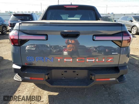 2022 Hyundai Santa Cruz SE с VIN 5NTJADAE7NH004948, выставлен на аукционе Copart как лот 73115444 с пробегом 24 012 миль миль и Списание • Salvage title. История ставок и продаж доступна на DreamBid. Изображение 6.