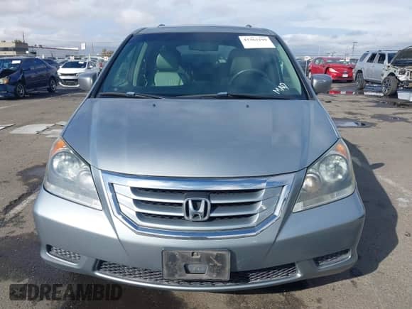 2008 Honda Odyssey EX-L with VIN 5FNRL38628B104477, listed as a IAAI auction lot 43363199 with 220,595 mi miles and . Bid and sale history available at DreamBid. Image 12.